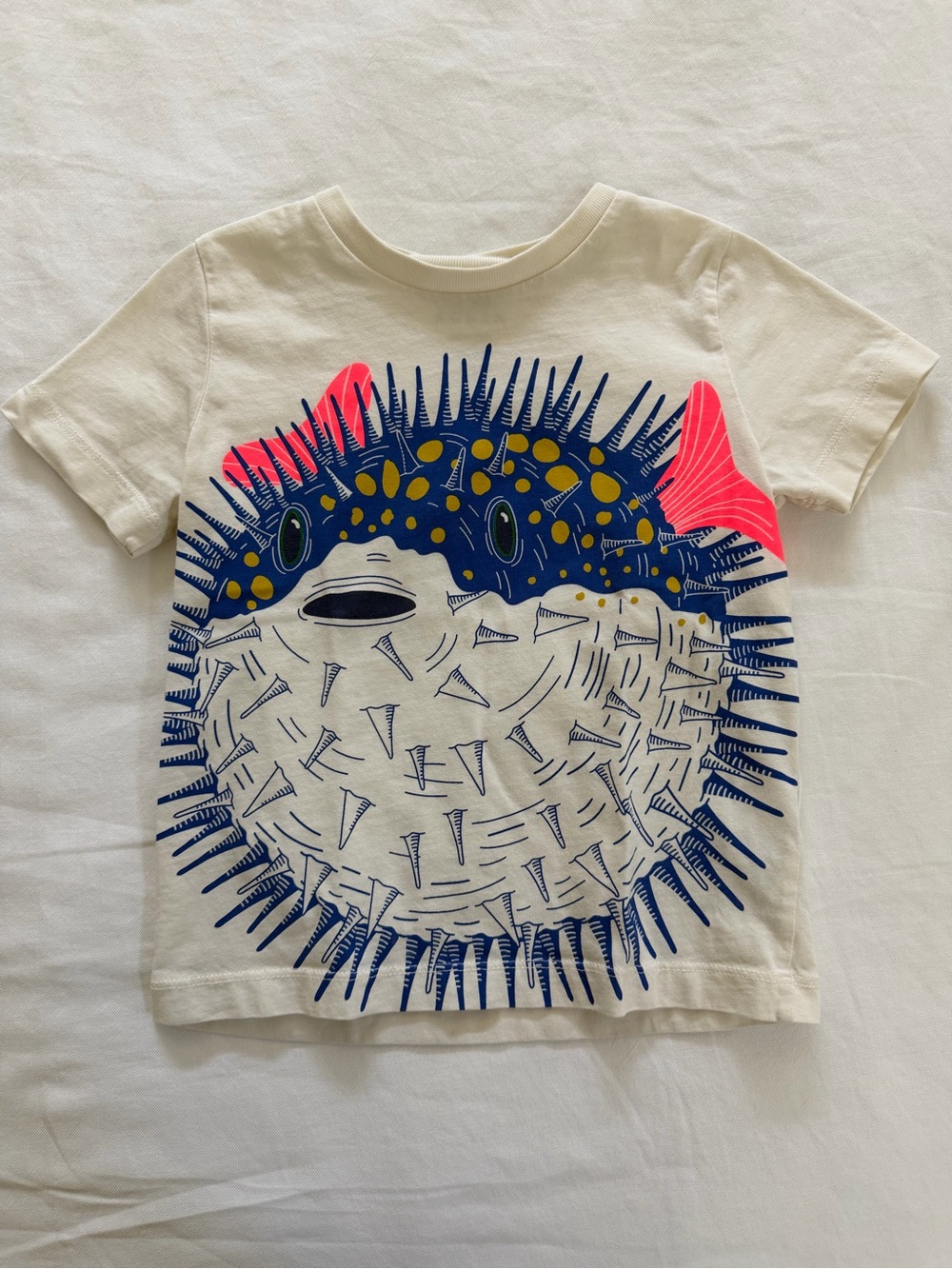 Mini Boden Cream Tee with Navy Pufferfish and Neon Pink Accents